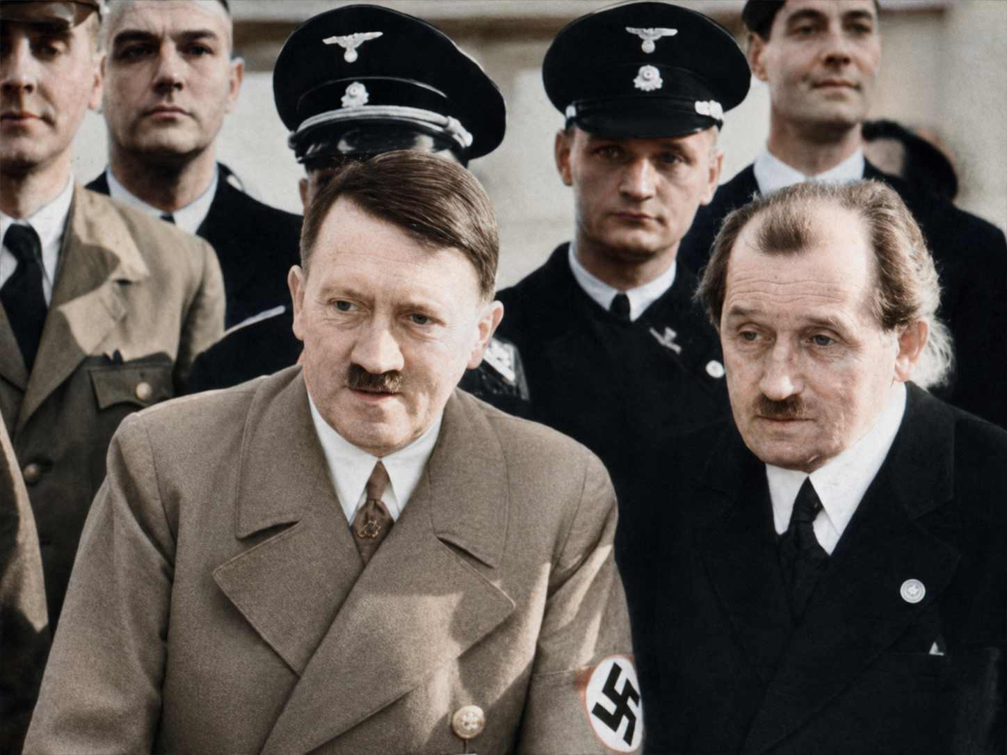 Ferdinand Porsche formally joined the Nazi Party in 1937, transforming an already advantageous relationship with the regime into an official political affiliation. The decision strengthened his access to Hitler, senior government officials, state contracts, materials, labor, and the institutional support needed to pursue increasingly ambitious engineering programs. Whatever Porsche’s personal devotion to Nazi ideology may have been, party membership was neither incidental nor imposed upon a powerless outsider; it was a calculated step taken by an established industrialist who understood the opportunities created by proximity to political power. His engineering achievements cannot be separated from that choice—or from the dictatorship that financed, protected, and ultimately weaponized his work.