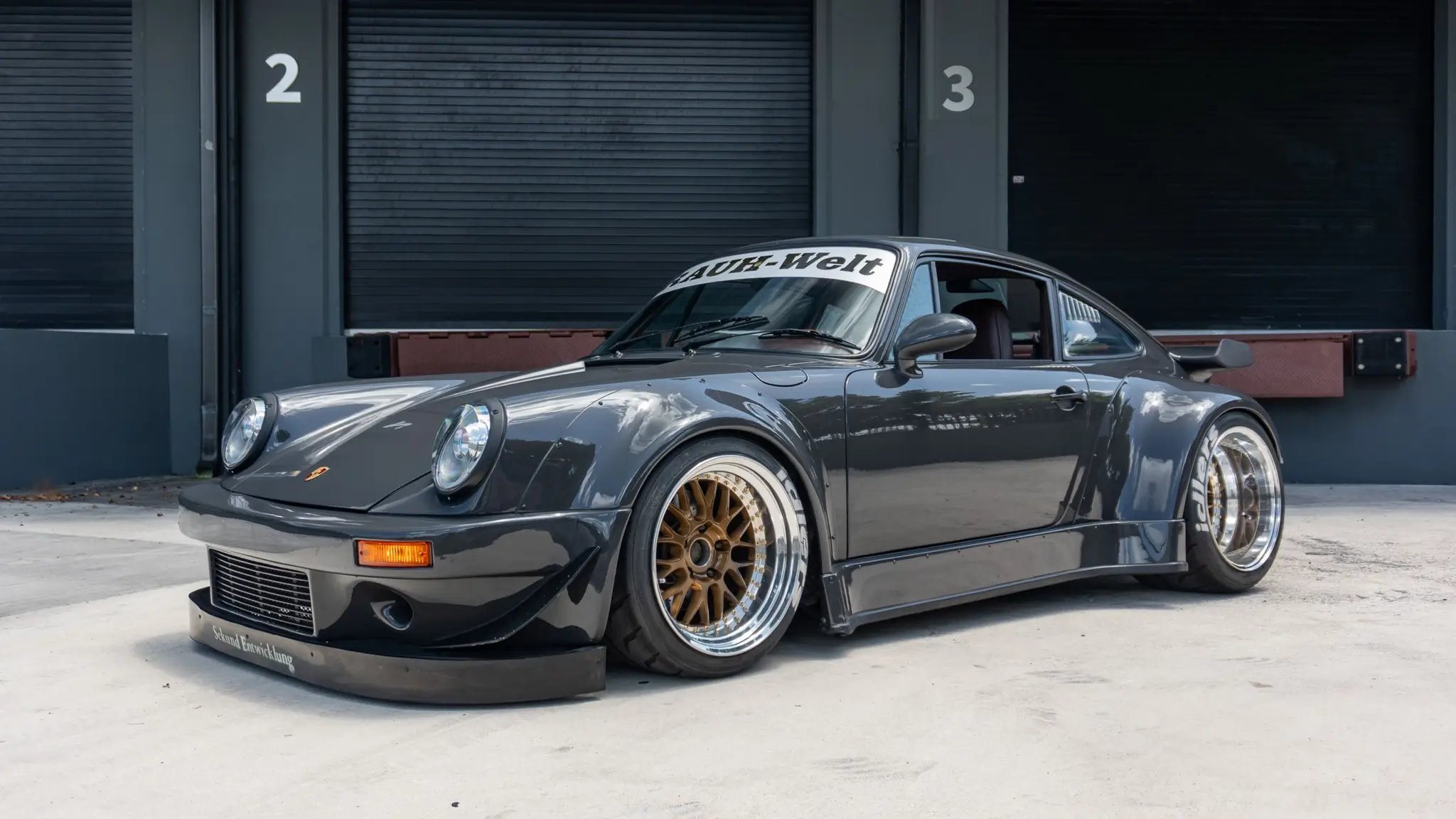 Load larger image of Twin-Turbo 1988 Porsche 911 Carrera Coupe RWB Widebody - Stuttcars Classified
