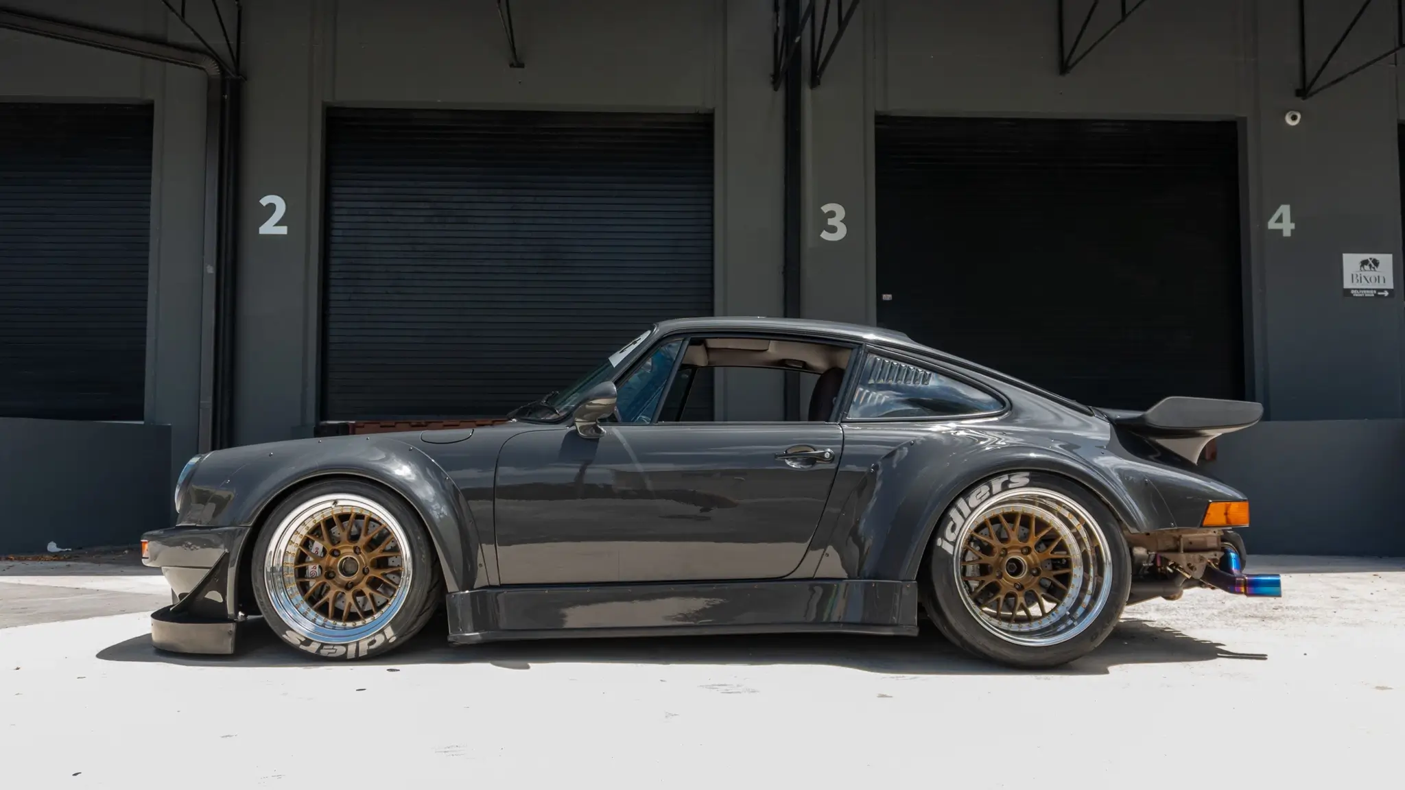 Load larger image of Twin-Turbo 1988 Porsche 911 Carrera Coupe RWB Widebody - Stuttcars Classified