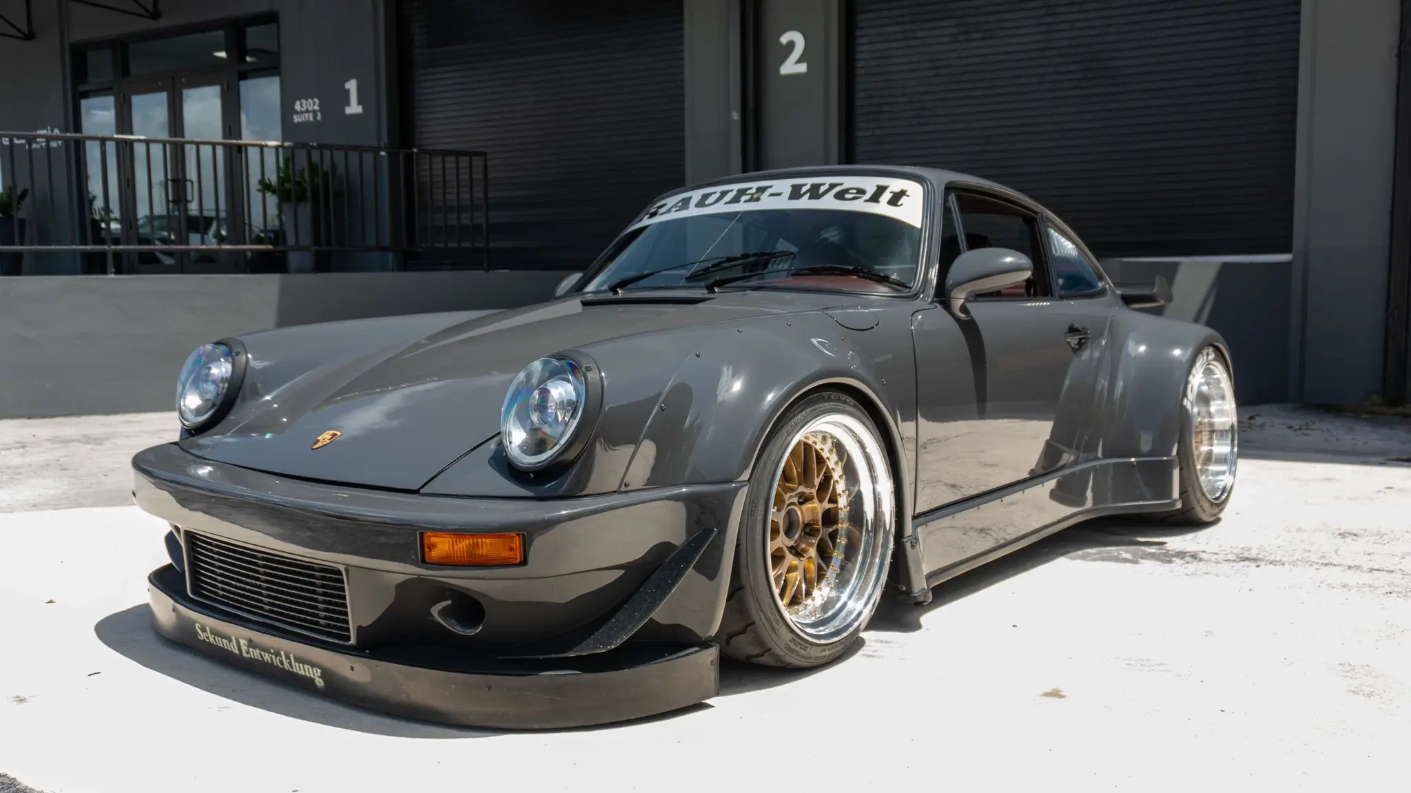 Load larger image of Twin-Turbo 1988 Porsche 911 Carrera Coupe RWB Widebody - Stuttcars Classified