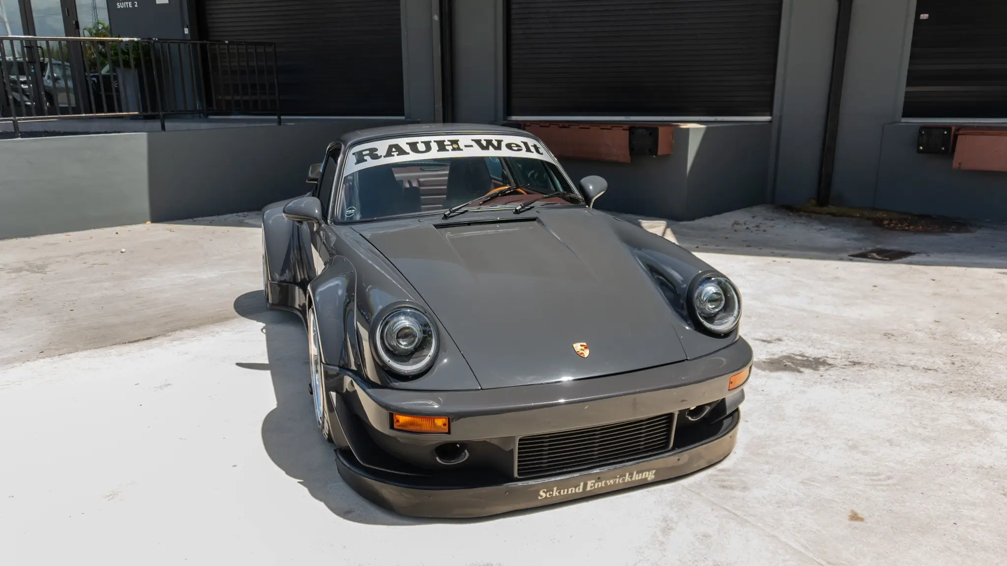 Load larger image of Twin-Turbo 1988 Porsche 911 Carrera Coupe RWB Widebody - Stuttcars Classified