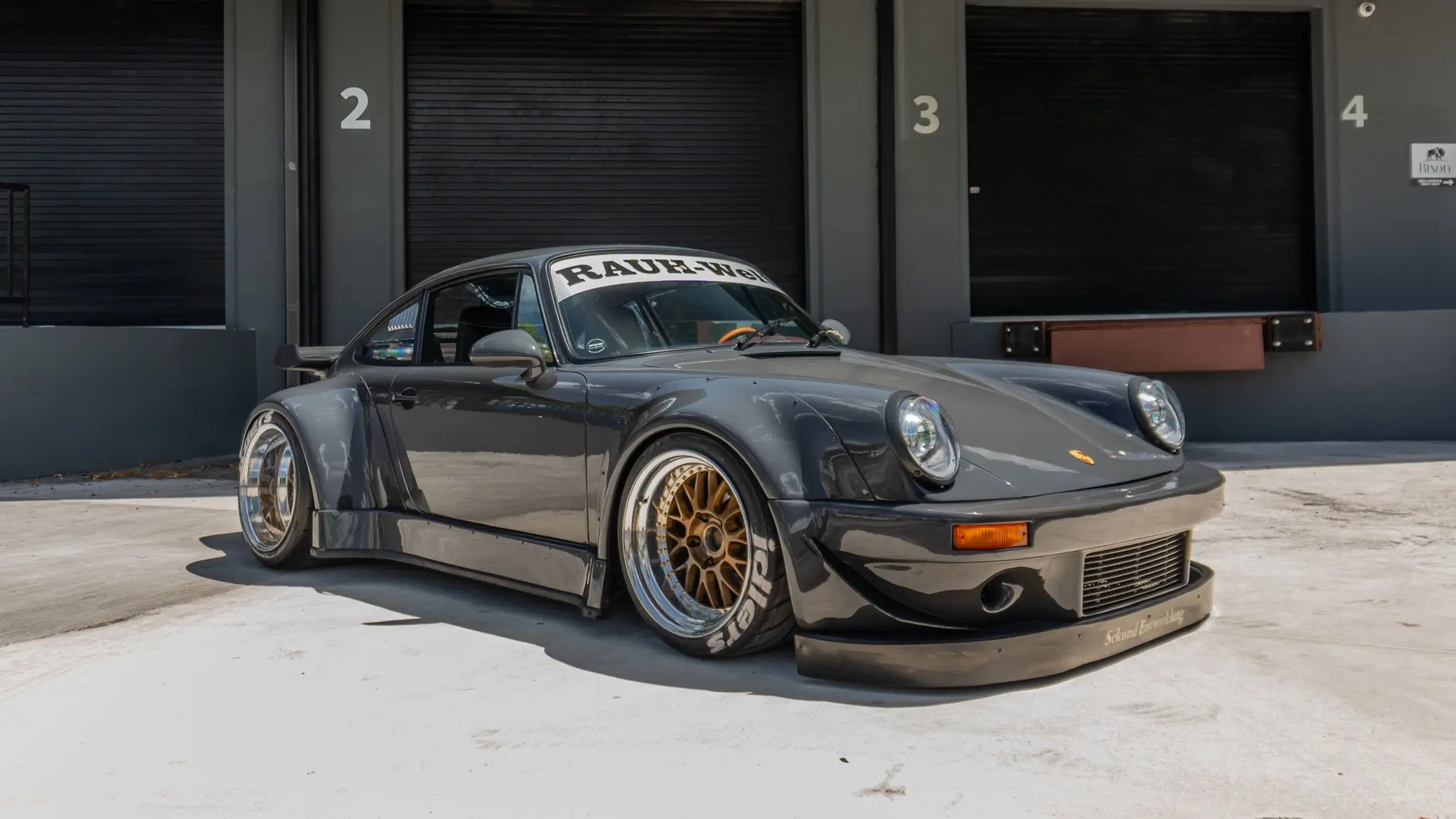 Load larger image of Twin-Turbo 1988 Porsche 911 Carrera Coupe RWB Widebody - Stuttcars Classified