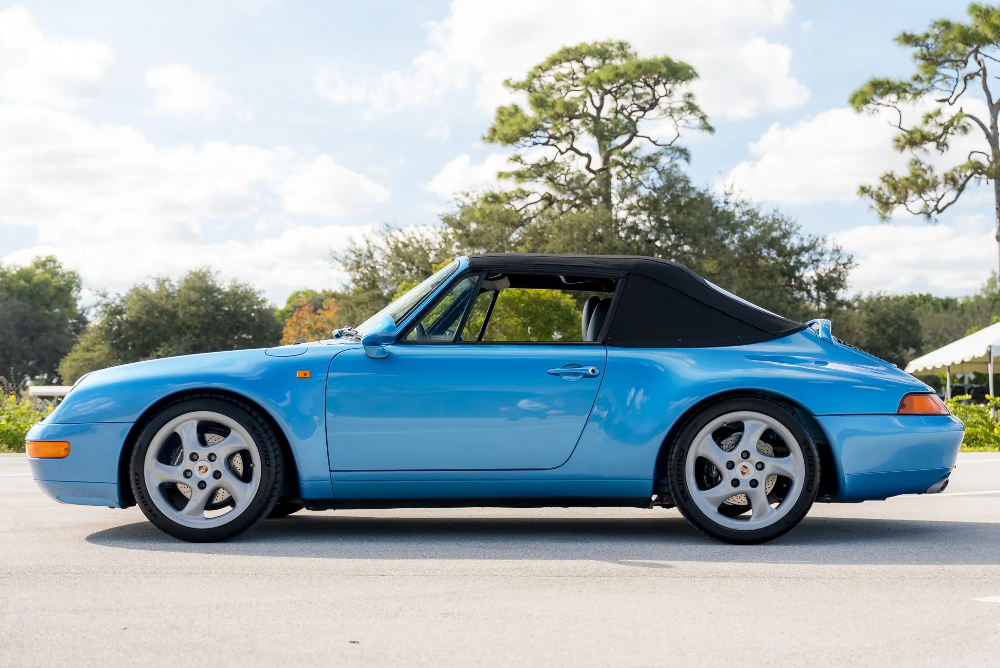 Load larger image of Tahoe Blue Metallic RoW 1995 Porsche 911 Carrera Cabriolet X51 - Stuttcars Classified