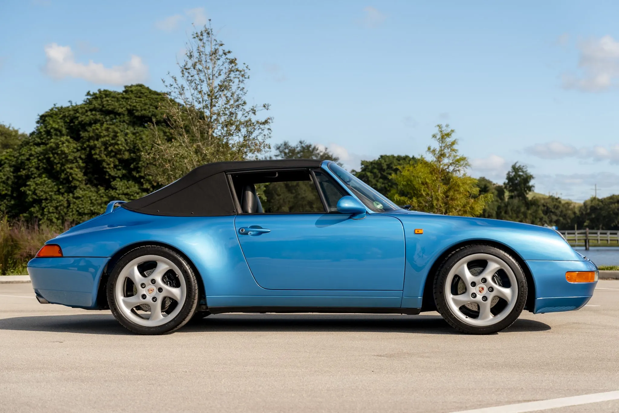 Load larger image of Tahoe Blue Metallic RoW 1995 Porsche 911 Carrera Cabriolet X51 - Stuttcars Classified