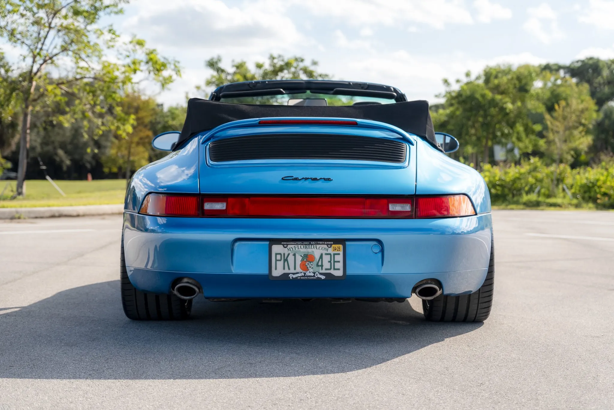 Load larger image of Tahoe Blue Metallic RoW 1995 Porsche 911 Carrera Cabriolet X51 - Stuttcars Classified