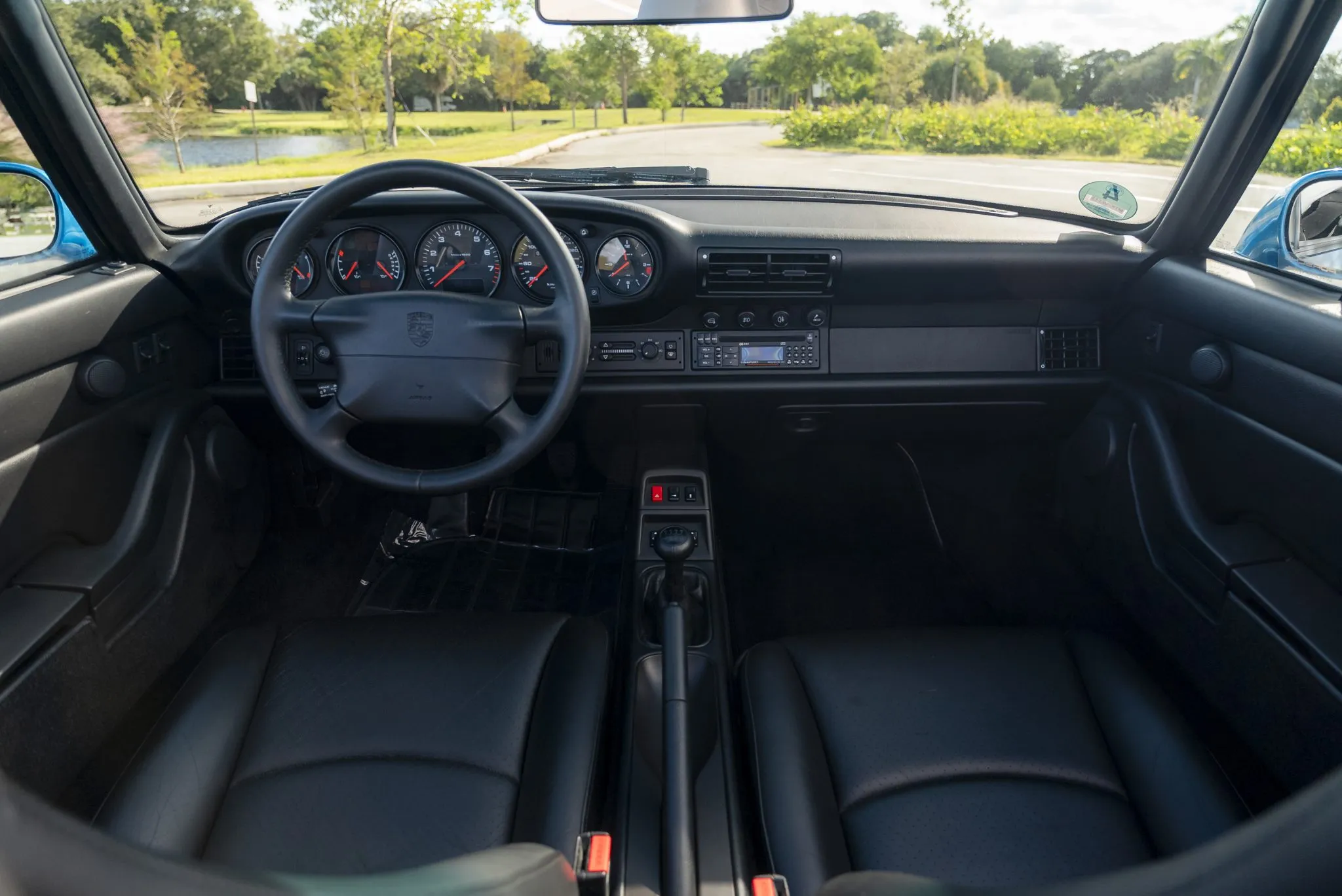 Load larger image of Tahoe Blue Metallic RoW 1995 Porsche 911 Carrera Cabriolet X51 - Stuttcars Classified