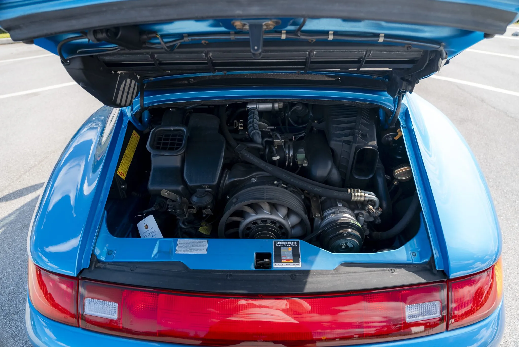 Load larger image of Tahoe Blue Metallic RoW 1995 Porsche 911 Carrera Cabriolet X51 - Stuttcars Classified