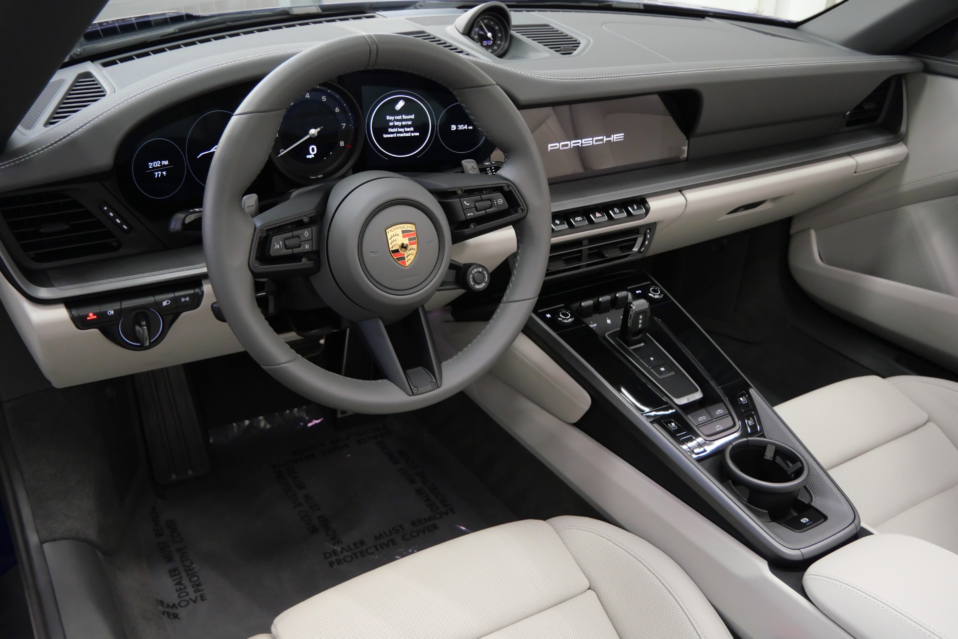 Load larger image of 2023 Porsche 911 Carrera Cabriolet - Stuttcars Classified