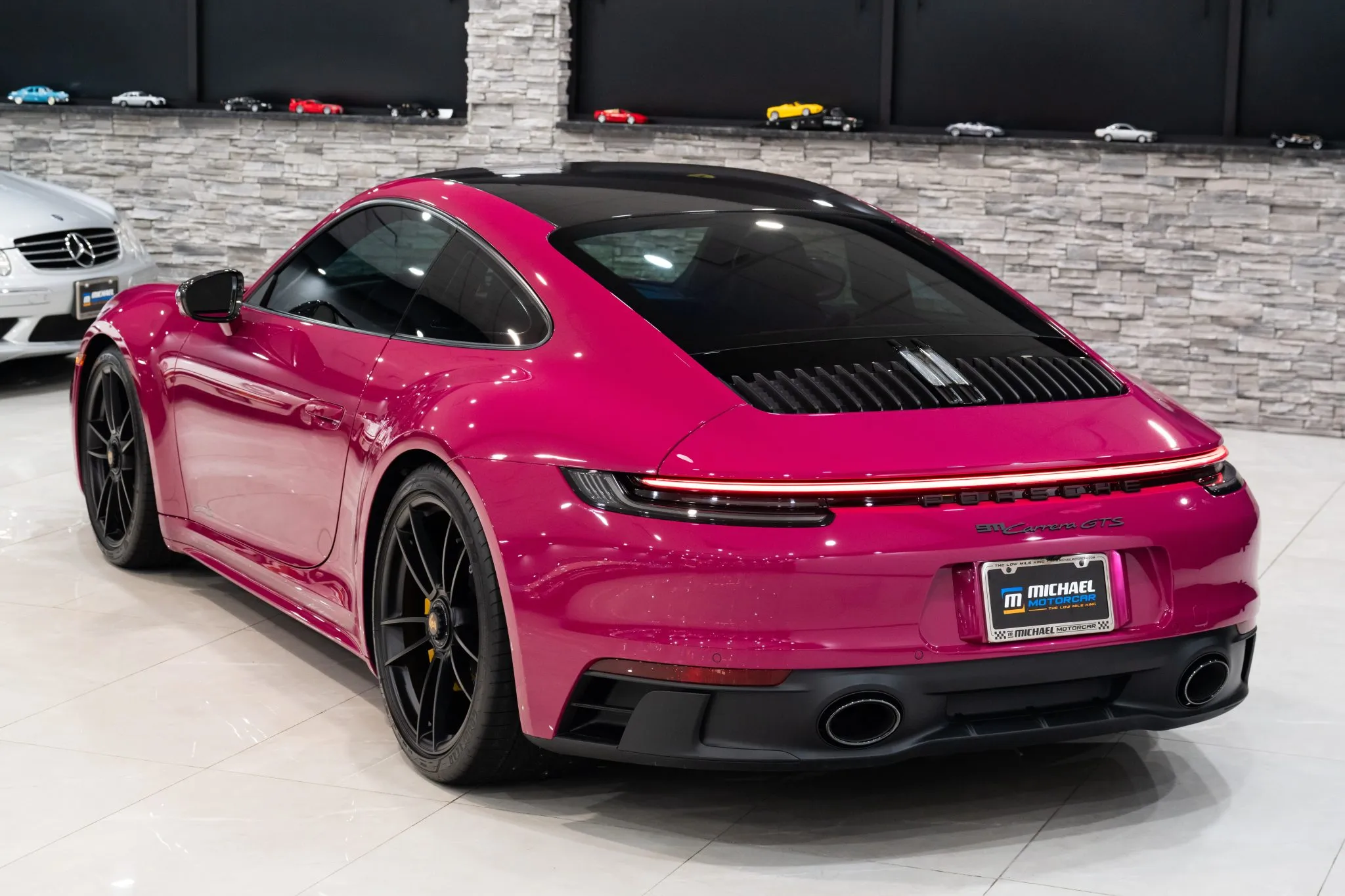 Load larger image of Ruby Star 2022 Porsche 911 Carrera GTS Coupe Lightweight - Stuttcars Classified
