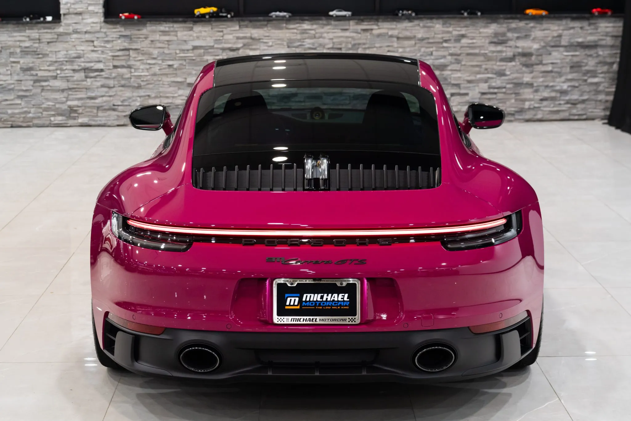 Load larger image of Ruby Star 2022 Porsche 911 Carrera GTS Coupe Lightweight - Stuttcars Classified